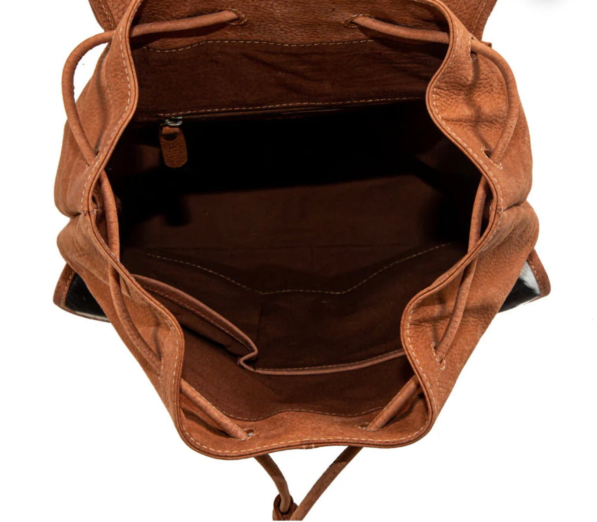 A brown leather drawstring bag shown open from a top-down view, displaying its interior compartments and lining against a white background.
